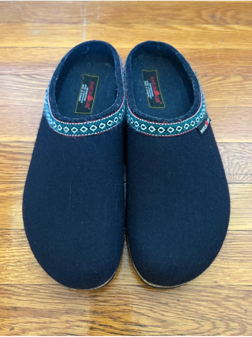 Haflinger Black Wool Slip-Ons with Teal and White Trim